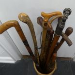 A vintage white metal mounted hardwood Walking Stick, the top modelled as a Turkish Gentleman in