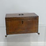 A George III mahogany Tea Caddy, of rectangular form, with hinged lid opening to reveal two metal