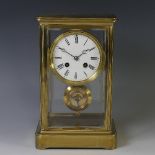 A 19th century French brass four-glass Mantel Clock, the movement stamped “B.R.”, striking on a