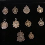 A collection of eight silver Watch / Prize Fobs, all with inscriptions, together with a silver ARP