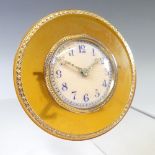 A pretty early 20thC French silver and gold mounted dressing table Clock, in the manner of