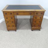 A Victorian twin pedestal Desk, with leather inset top, with three frieze drawers below and three