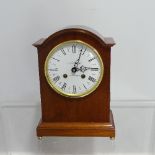 A modern Mantel Clock in the antique style, the white enamelled Roman dial marked 'J Guilsborough,