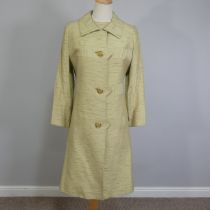 Vintage Fashion Tailoring, circa 1960s; a 'Leslie Gordon Couture, made in England', tailored light-