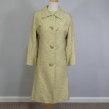 Vintage Fashion Tailoring, circa 1960s; a 'Leslie Gordon Couture, made in England', tailored light-