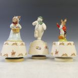 A pair of Royal Doulton musical Bunnykins figures, to include Mrs Bunnykins and Rock-A-Bye Baby,