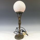 An Art Deco style bronzed globe Table Lamp, in the form of a nude lady holding a globe, H 43cm