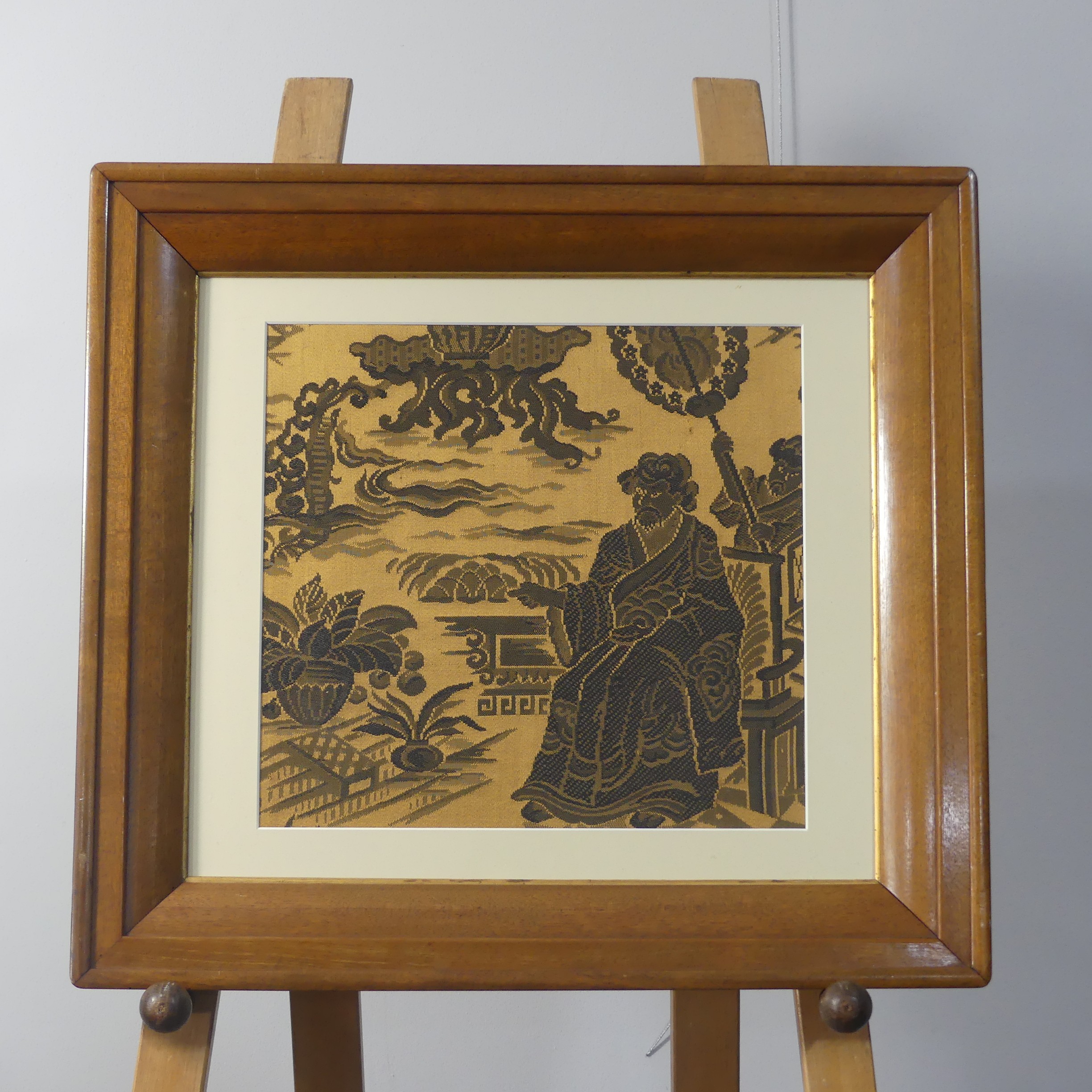 A Chinese woven silk Panel, depicting an elder on a throne among clouds, overmounted, framed in a - Image 2 of 4