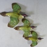 A set of three Beswick graduated Woodpecker Wall Plaques, model no 1344-1, to 1344-3, factory