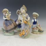 A Lladro figure of 'Ms Valencia', no 1422 modelled as a girl with a basket of oranges, together with
