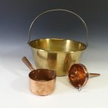 An antique brass jam Pan, 37cm diameter, together with a copper Saucepan and a copper Funnel (3)