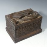 An Anglo-Indian carved hardwood Box, the sides carved with floral motifs, the lid with carved