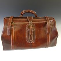 A vintage leather Gladstone bag, W:54cm x H:30cm x D:30cm.