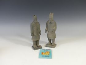 A pair of reproduction Terracotta Army figures, H 22cm, cased, with certificates (2)