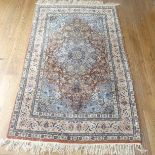 Tribal Rugs; a finely hand-knotted Persian rug, wool pile on cotton base, pale blue, light brown and