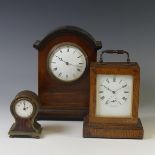 An Edwardian mahogany mantel Clock, with arched case, 22cm high, together with a French oak cased
