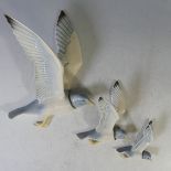 A set of three Poole pottery graduated Seagull Wall Plaques, model no 816, factory marks to base,