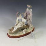 A Lladro Figural Group 'Springtime in Japan', depicting two Geisha on a bridge beside a swan, damage