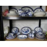 A Booths Willow Pattern Dinner and Tea Service, comprising a Teapot, three Jugs, six Cups and