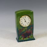 A Moorcroft 'Finch' pattern Mantel Clock, with tubelined decoration on green ground, factory marks