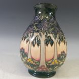 A Moorcroft 'Cluny' pattern Vase, with tubelined decoration on salmon pink ground, factory marks