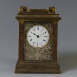 An ornate miniature French brass Carriage Clock, circa late 19th/early 20th century, of five-glass