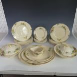 A Royal Doulton 'Minden' pattern Dinner Service, comprising twelve Dinner Plates, six Tea Plates,