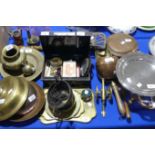 A quantity of Brass and Copper wares, including oriental brass trays, bell and a vase (eight items),