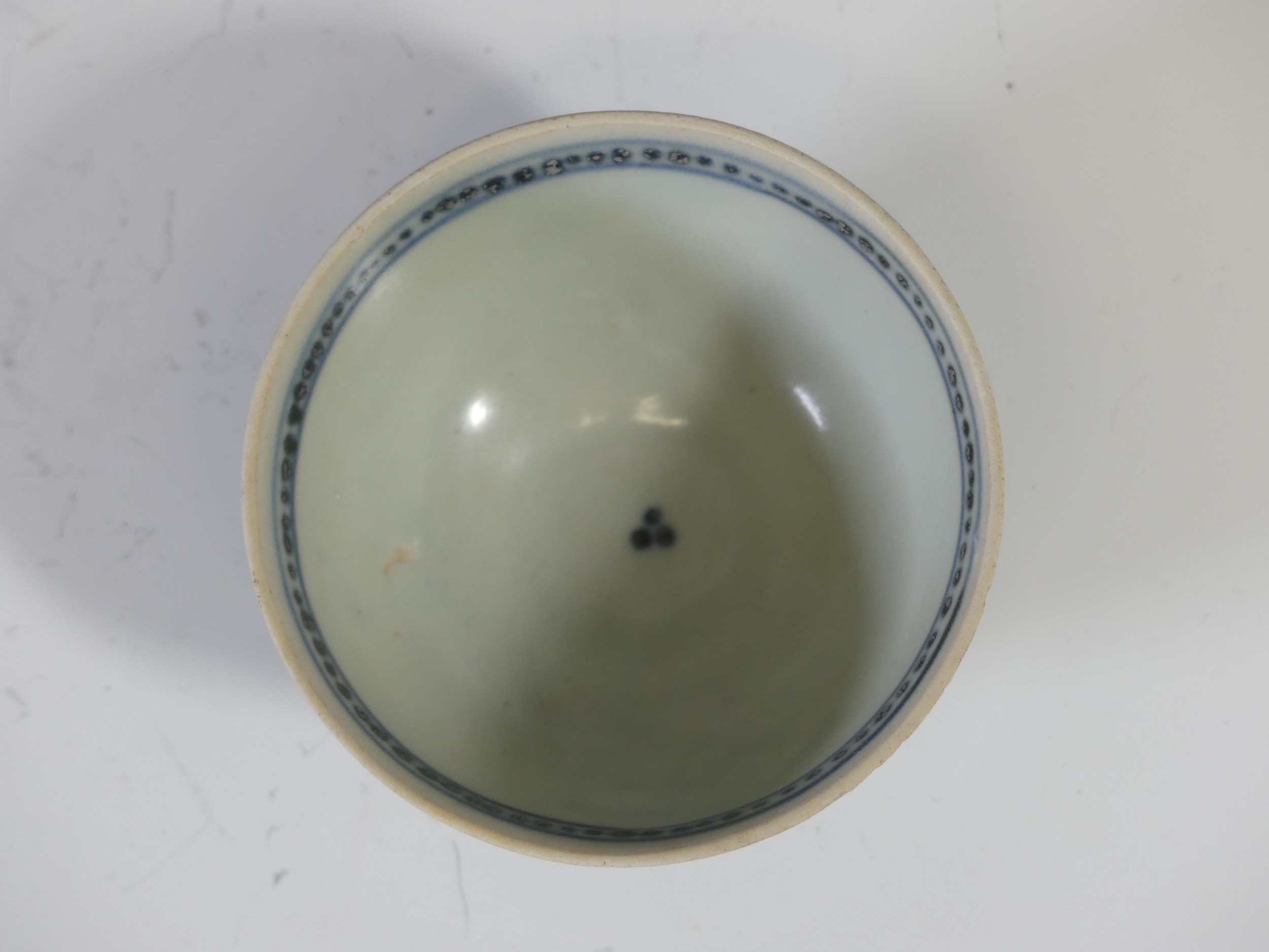 A Chinese Export 'Tek Sing Treasures' blue and white porcelain Tea Bowl and Saucer, decorated with a - Image 4 of 6