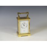 A gilt brass Carriage Clock, of traditional five glass form, dial marked "Huber, London", the 8-