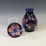 A Moorcroft 'Anenome' pattern Vase, tubelined decoration on blue ground, factory marks to base, H