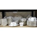 A Mintons 'Ancestral' pattern part Dinner and Tea Service, comprising eighteen Cups and Saucers,