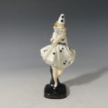 A Royal Doulton figure Pierette HN644, designed by Leslie Harradine, issued 1924-38, green printed