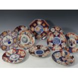 A quantity of late 19thC Japanese Imari porcelain scalloped edge Plates, each decorated with