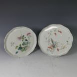 A pair of Chinese porcelain lobed Plates, decorated with flowers and fruit in colourful enamels,