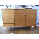 A retro 1960s Scandinavian mahogany and sycamore Sideboard, the rectangular top above a fall front