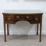 Georgian-style mahogany bow-front Dressing Table, the shaped top with reeded edge above three