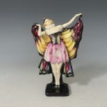 A Royal Doulton figure 'Butterfly' HN719, modelled as a girl in costume, designed by Leslie
