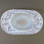 A R Lalique opalescent glass 'Medicis' oval Ashtray, relief moulded with maidens amongst flowers, 15