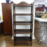 A 20thC mahogany open waterfall Bookcase, the gallery top above five shelves on bracket feet, W 51cm