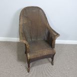 A retro Lloyd Loom tub Armchair, with makers label to base, W 68cm x D 48cm x H 100cm.