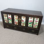 An early 20thC Chinese hardwood Cabinet, the rectangular top above tiled cupboards with four drawers