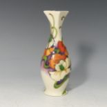 A Moorcroft Collectors Club 'Demeter' Vase, tube lined decoration on cream ground, designed by