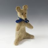 An early 20thC plush blonde mohair Kangaroo, with long nose, small plastic eye stiff limbs.