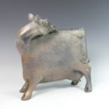 Lawson E. Rudge (b. 1936), a bronze resin sculpture of a Cow, with silver metallic finish, H 37cm.