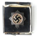 A German WW2 period German Cross, in Silver, unmarked version, probably by Deschler, with the