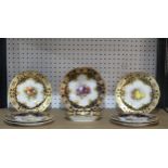 An early 20thC Royal Worcester part Dessert Service, each piece decorated with fruit and set