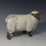 Keza Rudge (British 20th Century), a pottery model of a Sheep, signed K Rudge, L 28cm x H 22cm.