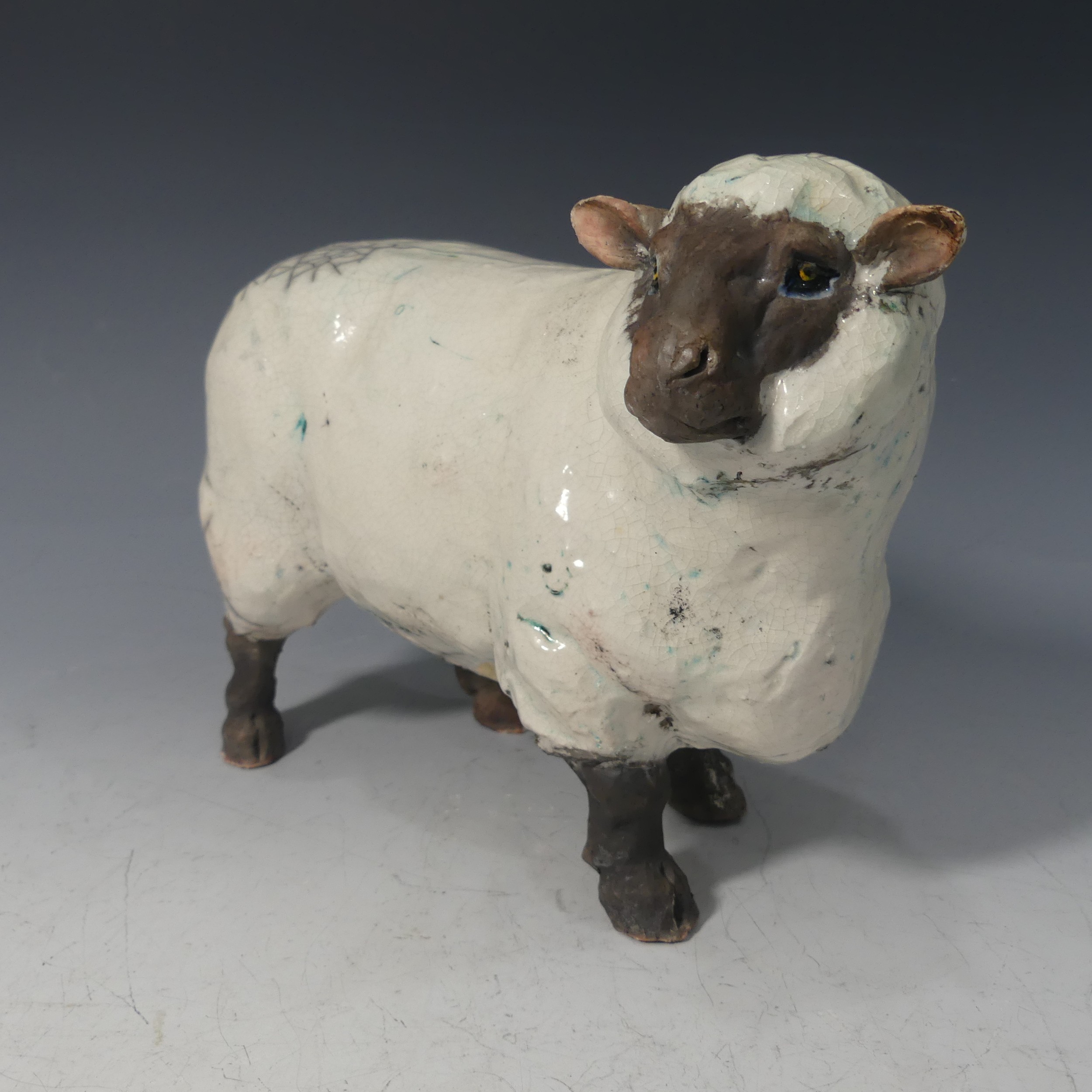 Keza Rudge (British 20th Century), a pottery model of a Sheep, signed K Rudge, L 28cm x H 22cm. - Image 2 of 7