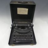 A circa 1940s 'Remington Noiseless Portable Typewriter', in original case.